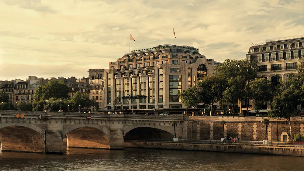 A limestone façade on the Seine at golden hour